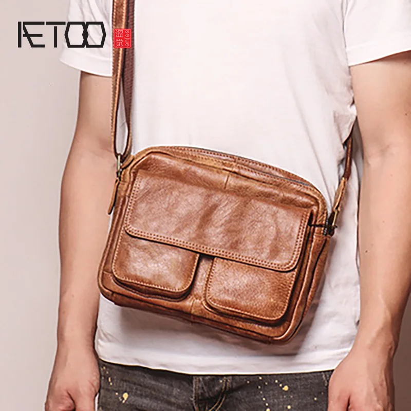 

AETOO Men's leather one-shoulder bag, matte leather stiletto bag, fashion bag.