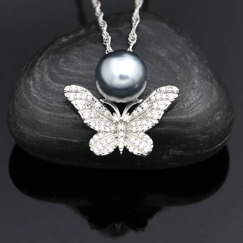 Набор женских ювелирных изделий из серебра 925 пробы Серёжки и кольцо с кулоном