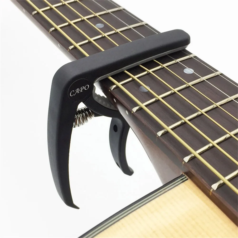 Cejilla de plástico para Guitarra eléctrica clásica acústica, abrazadera de ajuste de liberación rápida, accesorios para instrumentos musicales, 6 cuerdas