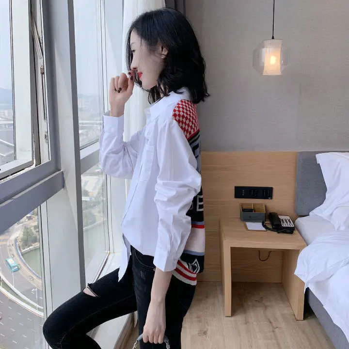 

European station autumn 2020 new European women's top design sense minority shirt Korean splicing white shirt