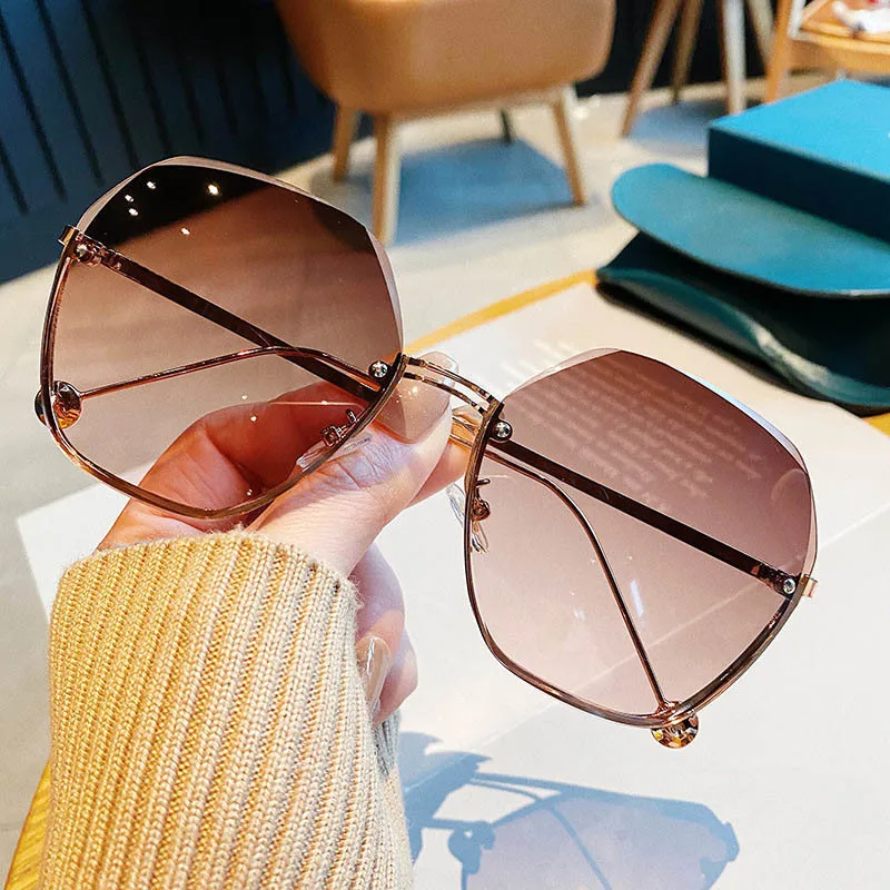 

High Quality women's Round Sunglasses Lady Metal Rimless Shades Luxury Sunglasses Female Driving Glasses zonnebril dames UV400