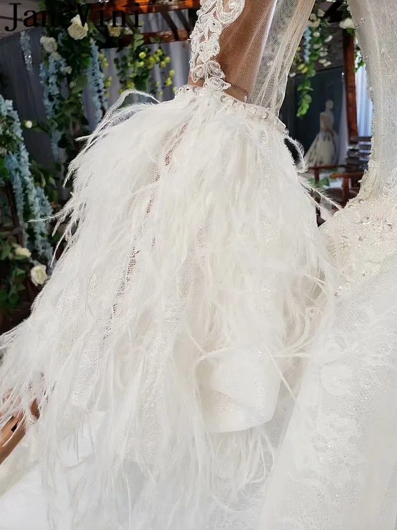 JaneVini Dubai Beaded Wedding Dress Feathers Long Sleeves Lace Pearls Ball Gown Bridal Dresses Luxury African Wedding Gowns 2020