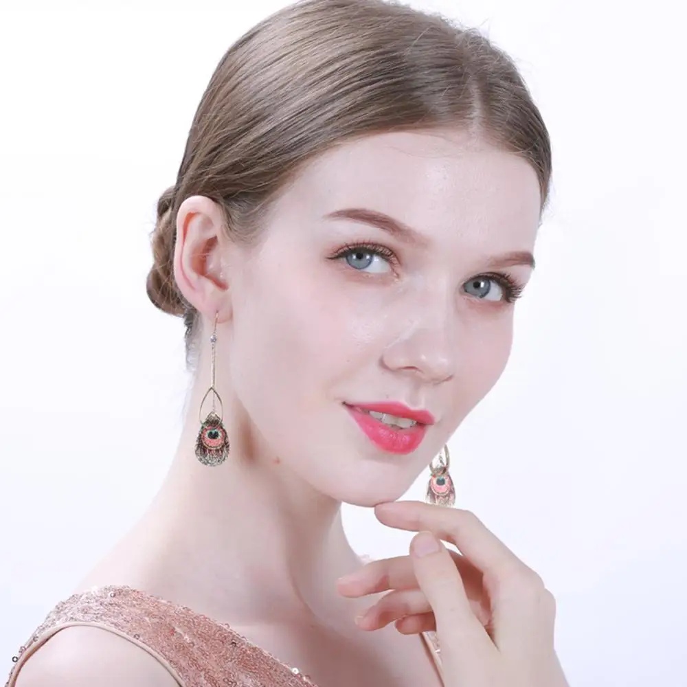 

Модные ювелирные изделия KIVN в стиле бохо, висячие серьги с павлиньими перьями для женщин и девочек, подарки на день рождения, Рождество, День...