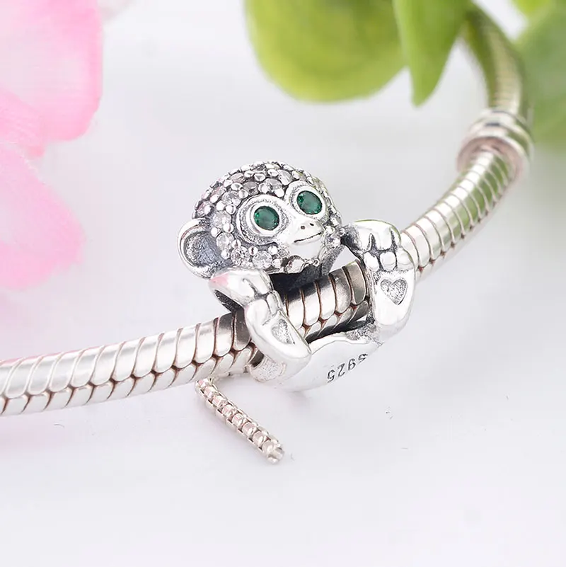 Браслет-Шарм глаз обезьяны из серебра 925 пробы с зелеными кристаллами | Украшения