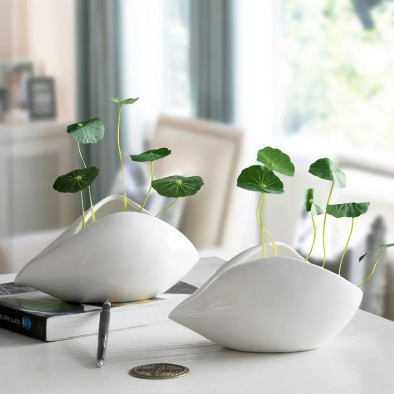 

Креативная белая художественная ваза в скандинавском стиле, керамическая ваза для цветов, гидропонное устройство, настольное ремесло, евро...