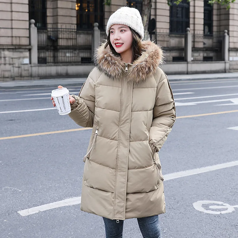 Женская длинная парка с капюшоном и мехом однотонная Толстая зимняя куртка