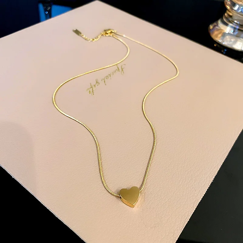 

Цепочка с подвеской в виде сердца золотого цвета