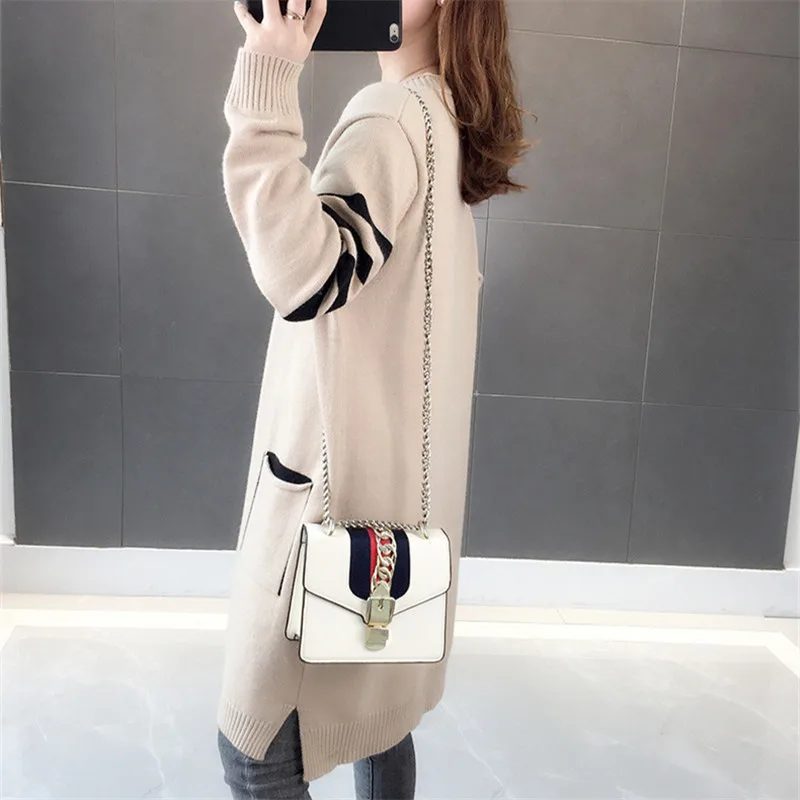 Женский трикотажный свитер средней длины кардиган с большими карманами и