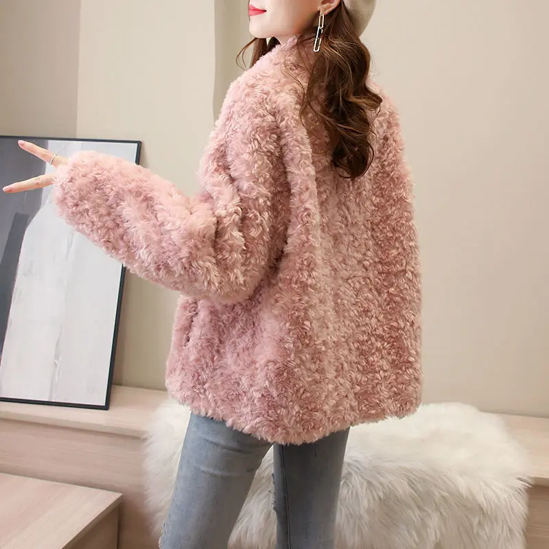 

2020 new lamb wool granule cashmere karaoke roll wool coat women fur coat Haining fur autumn winter women
