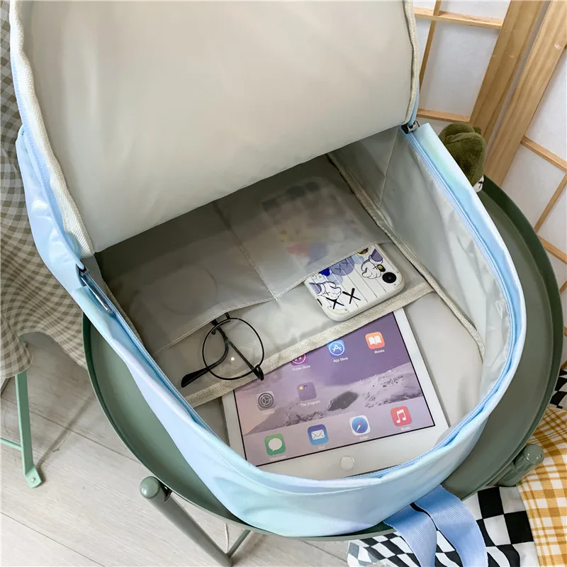 

Laser Color Cool Cute Backpacks Fashion Book Student School Bags For Teenage Girls Women Nylon Badge 2021 Trendy New