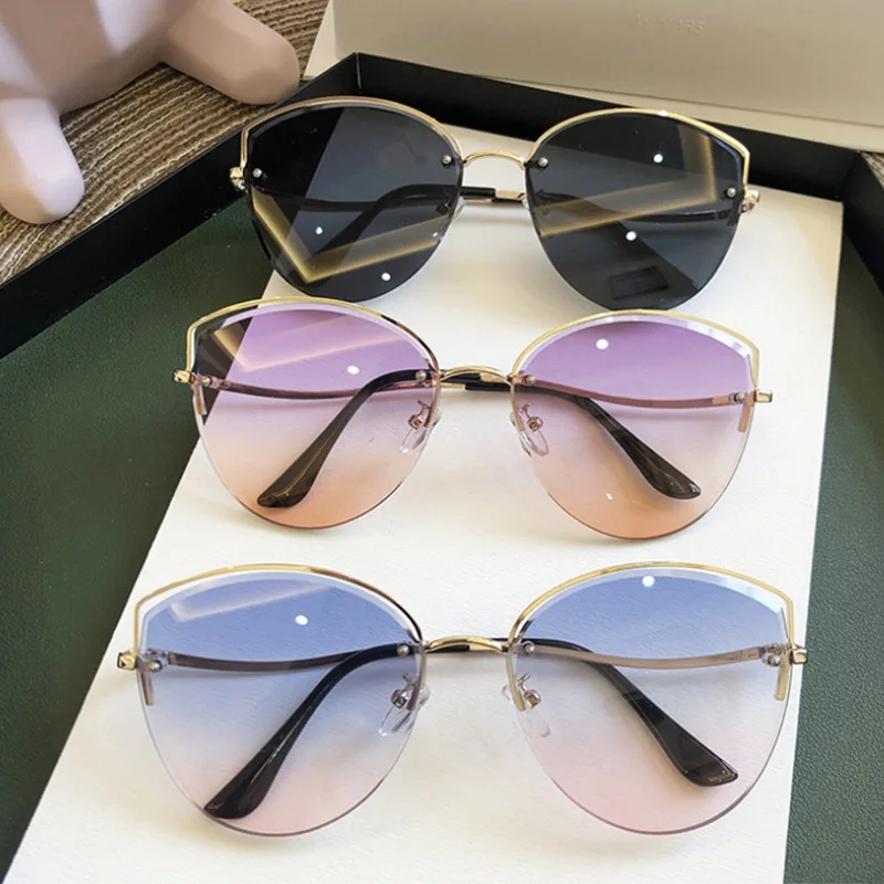 

High Quality women's Oval Cat Eye Sunglasses Lady Metal Rimless shades Luxury Sunglasses Female Driving Glasses zonnebril dames