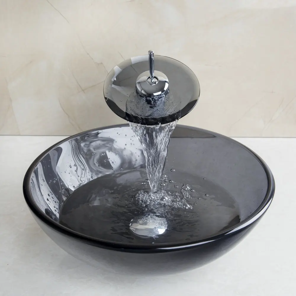 

OUBONI Black Round Tempered Clear Glass Vessel Sink With Waterfall Mixer Water Pop Up Drain Transparent Bathroom Sink Set