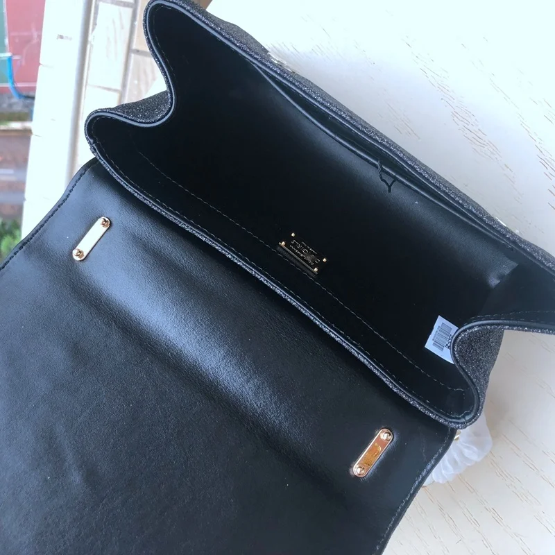 

The new leather women's bun head layer cowhy sequin oblique cross-chain small square bag Baroque European and American wind