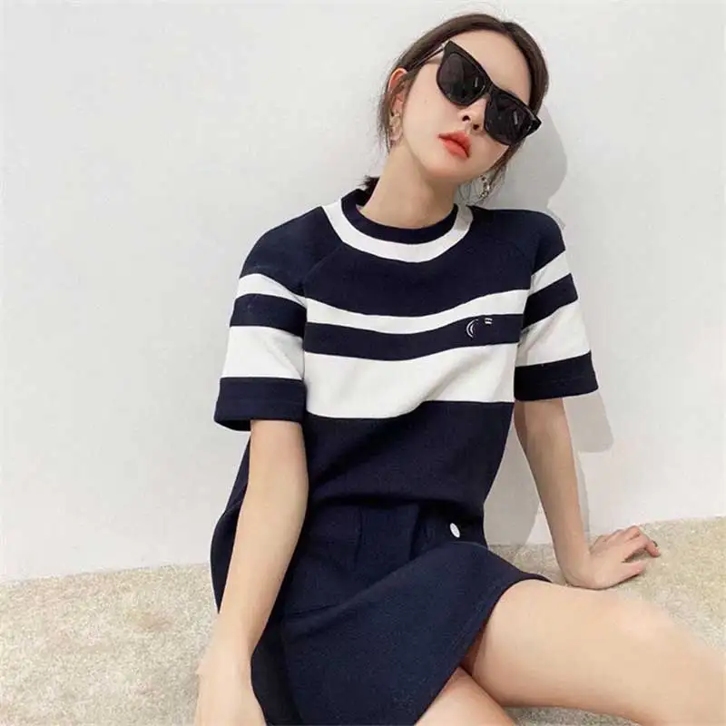 

Summer high-quality color matching pockets, buttons, letters, round neck, short sleeves, small A version knitted dress new