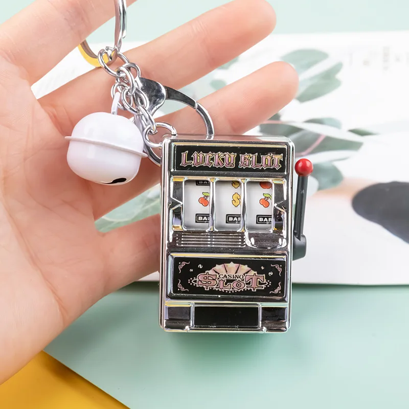 

Toy Keychain Mini Fruit Digital Lottery Machine Keychain Novelty Palm Slot Game Machine Keychain Simulation Model Toy
