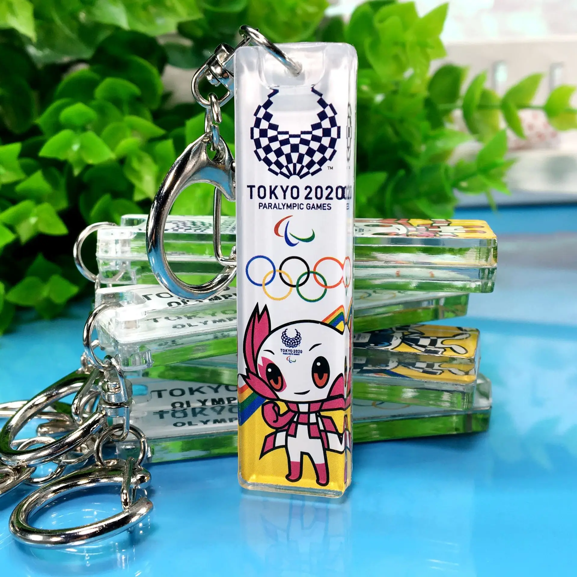 

2020 Japan Tokyo Olympics Souvenir Keychain Blue Miraitowa Red Someness Anime Acrylic Keychain Souvenir Pendant
