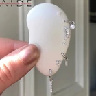 Серьги-гвоздики женские из серебра 925 пробы с фианитами