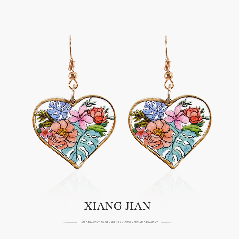 

Enjoy The Cross Border Hollow Out Alloy Earrings Women's Spring Flowers New Retro Wood Love Earrings