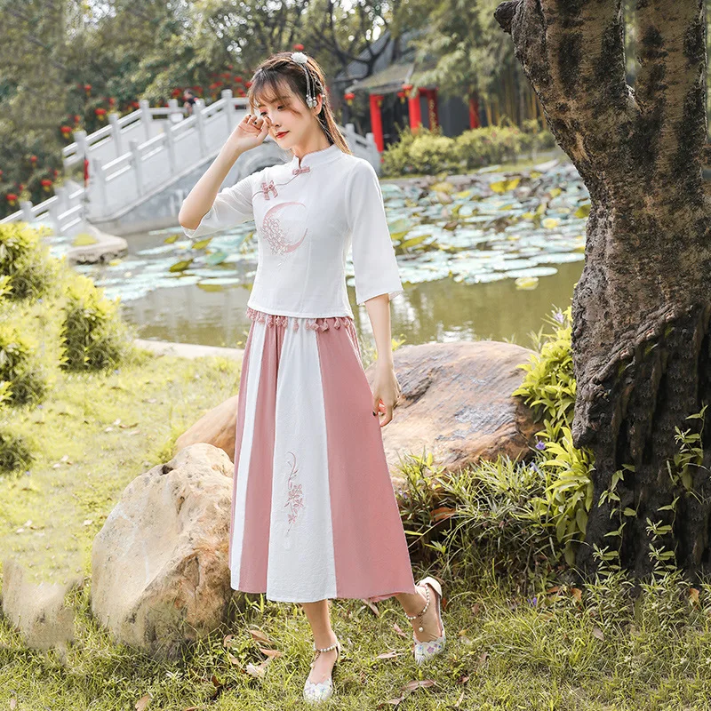 

Chinese retro 2020 spring and summer cotton and linen embroidered shirt color matching skirt casual suit female