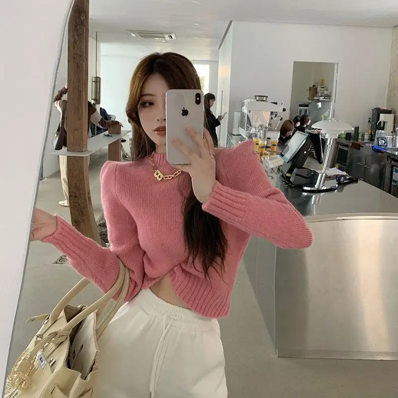 

Sweater design women's niche autumn and winter new round neck Pullover loose shoulder pad Korean Short knitted long sleeve top