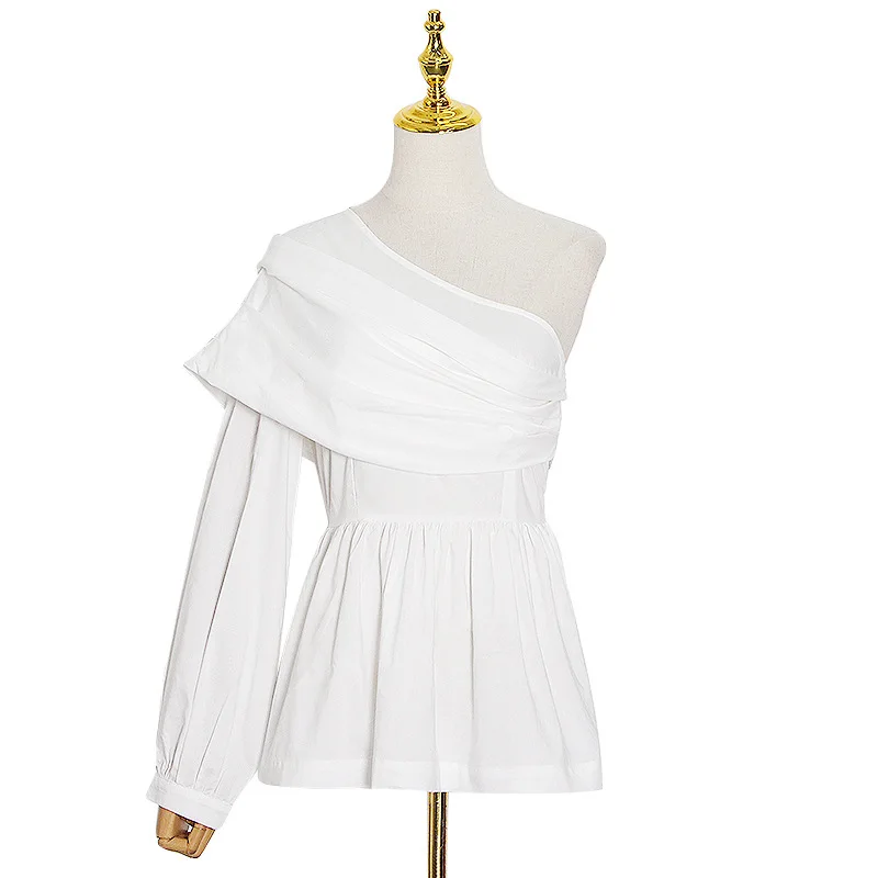 

In the spring of the new small and pure and fresh temperament joker single sleeve hem inclined shoulder female skirt joining to