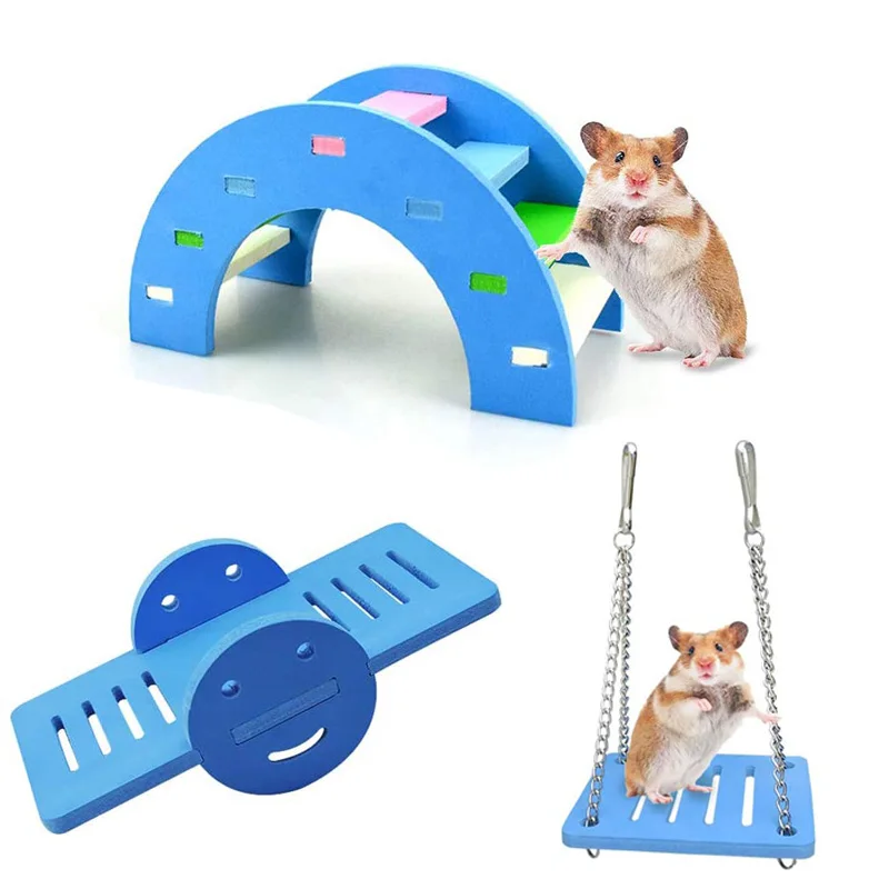 A hamster plays on the Hamster Toy Set, which includes a blue seesaw, an arch-shaped climbing structure, and a swing suspended by chains. This charming toy set is made from safe and durable materials, making it perfect for enhancing cage decor while ensuring your pet's safety.