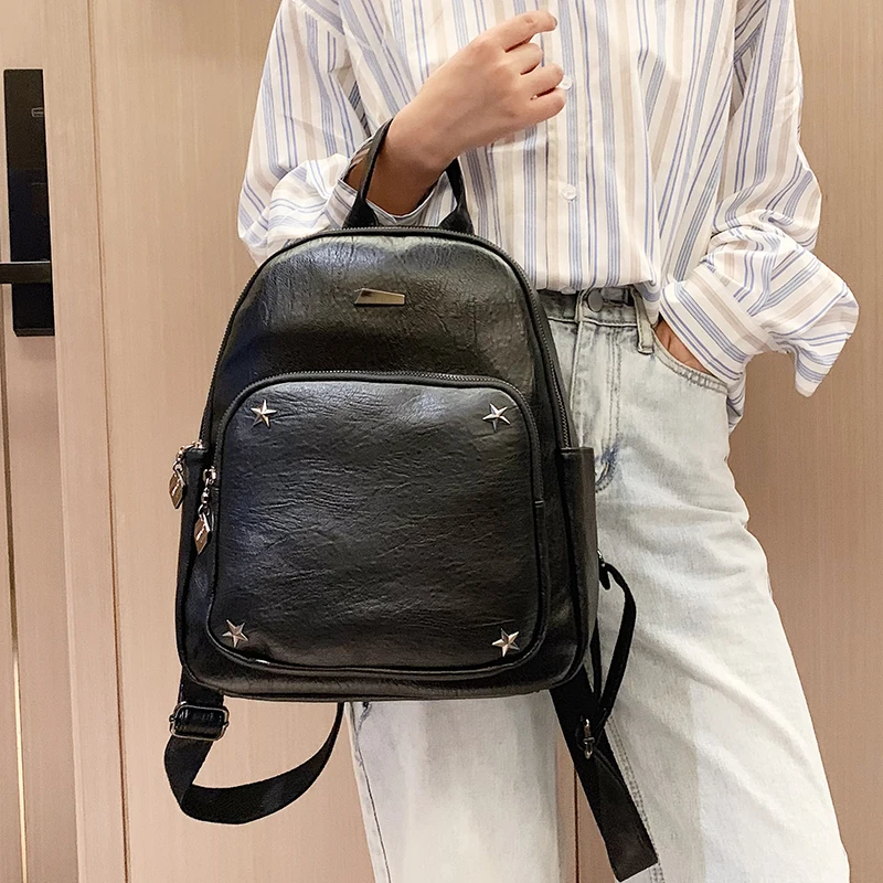 

Black Classic Holiday Backpack with Creative Rivet Women PU Shoulder Bookbags Elegant Female Multifunctional Leather Mochila Sac