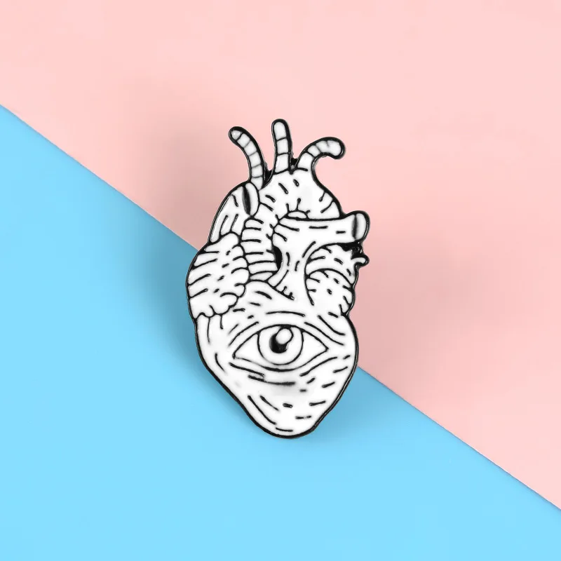 Фото Эмалированная брошь в виде человеческого сердца для глаз и органов артериальные