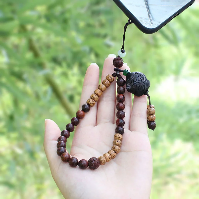 

New hand-woven Chinese style mobile phone lanyard sandalwood bodhi mobile phone chain wrist rope anti-lost female jewelry