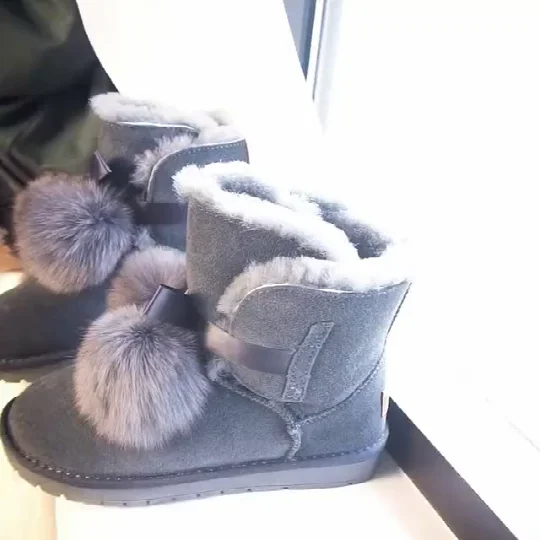 

Wholesale Women Fashion Trend Furry Balls Snow Boots Winter Boots Ladies Warm Genuine Casual Shoes