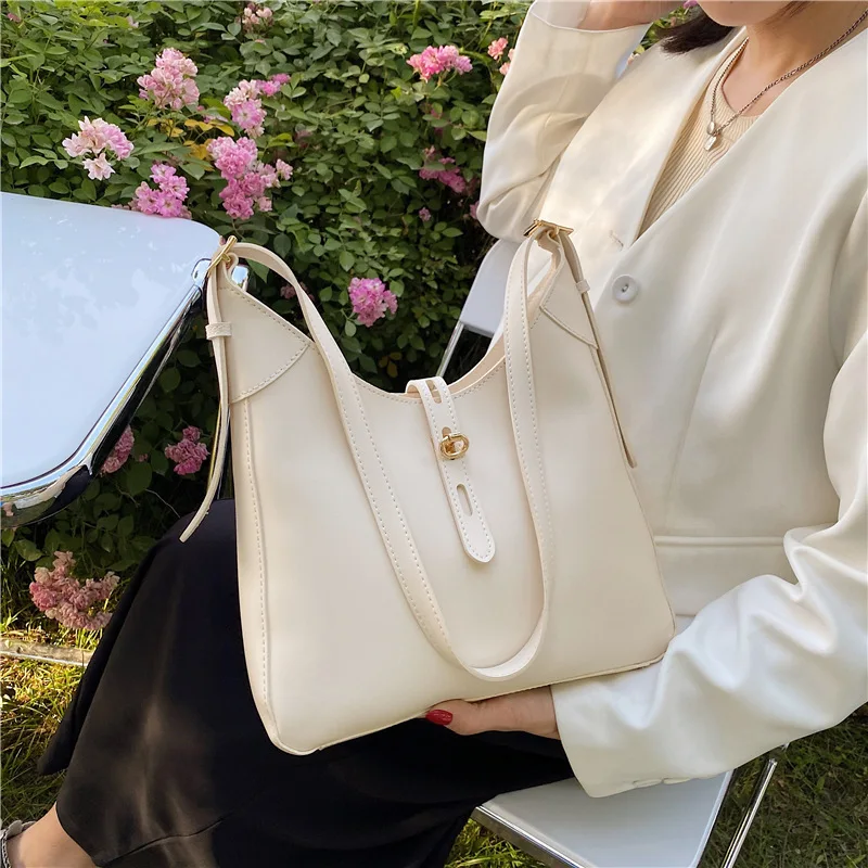 

Женская сумка-мешок из мягкой кожи, с плечевым ремнем