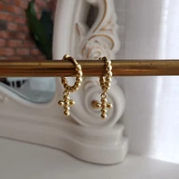 u magical french round bead cross hoop earring for women gold color hollow metallic statement earring jewelry accessories