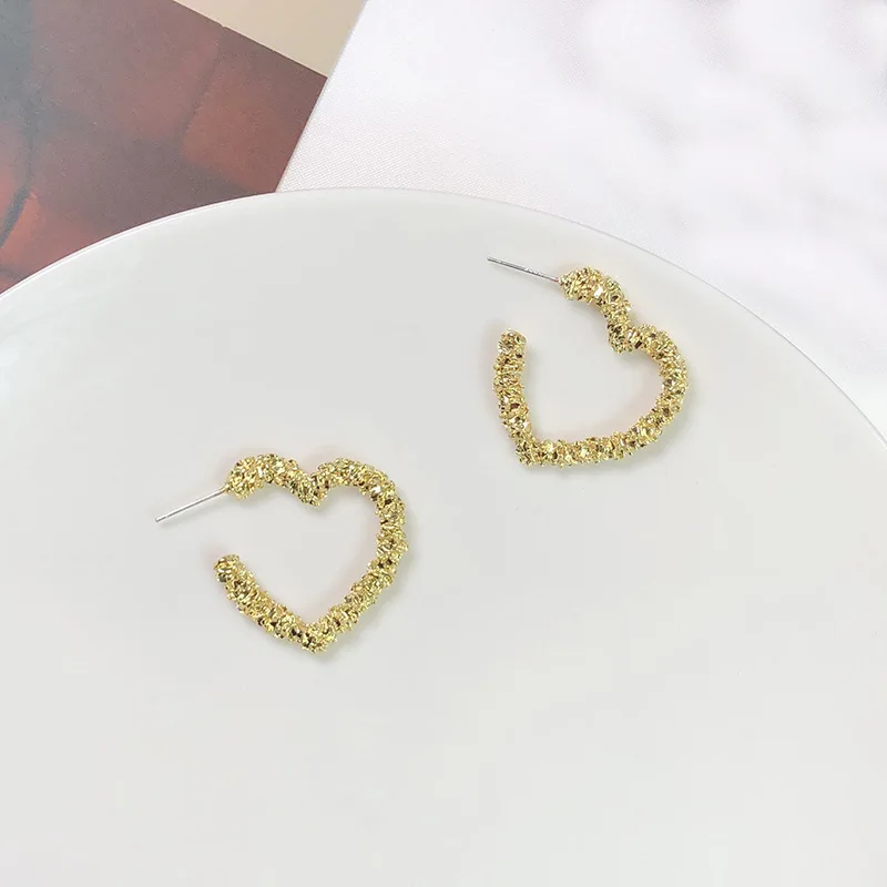 

New Style Bump Shinning Love Heart Carved Openings Earrings Hyperbole Girl Ear Studs Women Jewelry S925