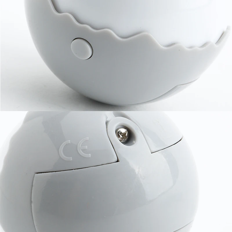 Электрическая игрушка для кошек - вращающийся автоматический мячик с перьями, создающий движение и интерактивное взаимодействие с животным.