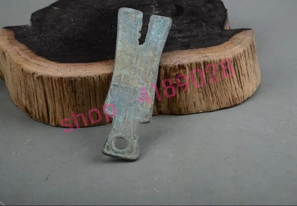 Старинные бронзовые монеты ножей в елочку антикварные сосуды коллекционные