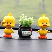 moving head little yellow duck car decoration ornaments creative home decoration resin crafts car accessories interior