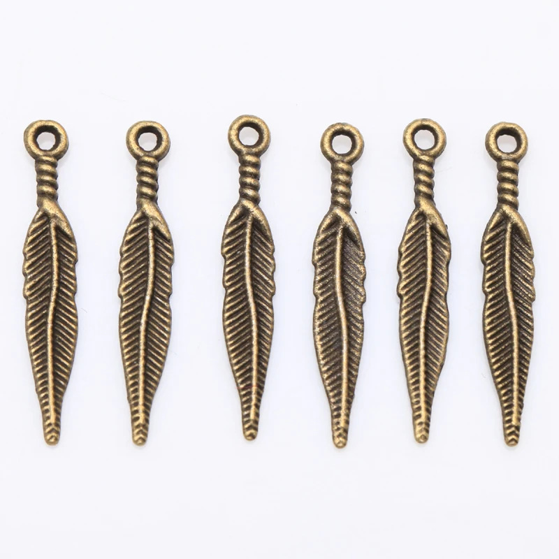 100 шт Ретро сплава Длинные острые подвески в виде листьев ювелирных изделий для