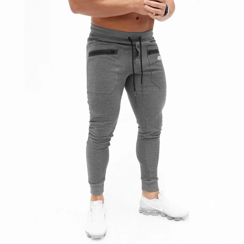 

Spring and autumn men's fitness tying rope sports tight cotton trousers with large zipper pockets running jogging sweatpants