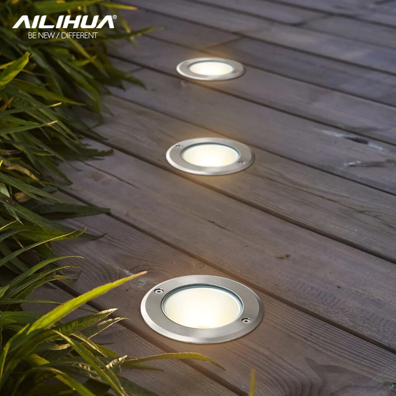 светильник в пол. подсветка террасы. подсветка в уличных ступеньках. уличная подсветка дорожек. фонарики в полу.