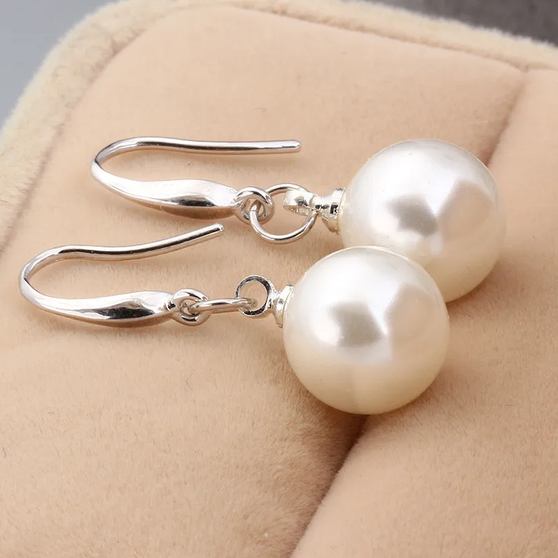 

Japanese and Korean version of trendy fashion temperament round shell beads pearl earrings long earrings earrings wholesale