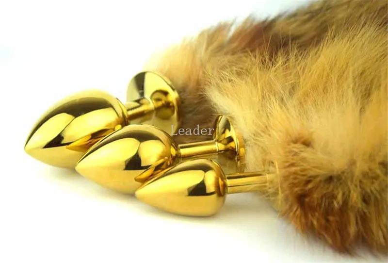 Анальная пробка металлического размера золотистая металлическая реальные