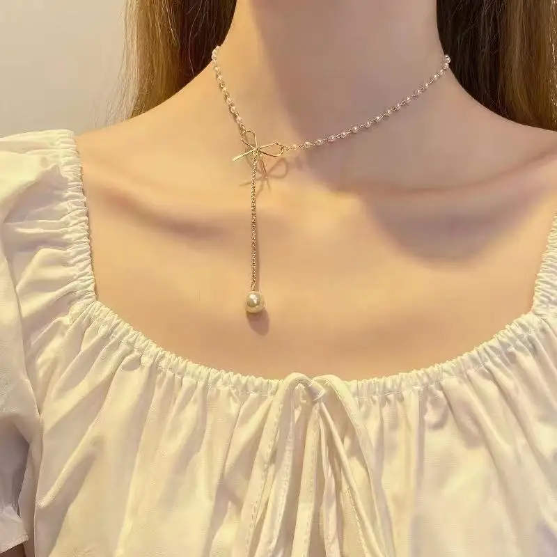 

Women's Bowknot Pearl Necklace with Chain on Neck Female Pairing Pendant Cute Aesthetic Pearl Necklace Decoration 2021 Jewelry