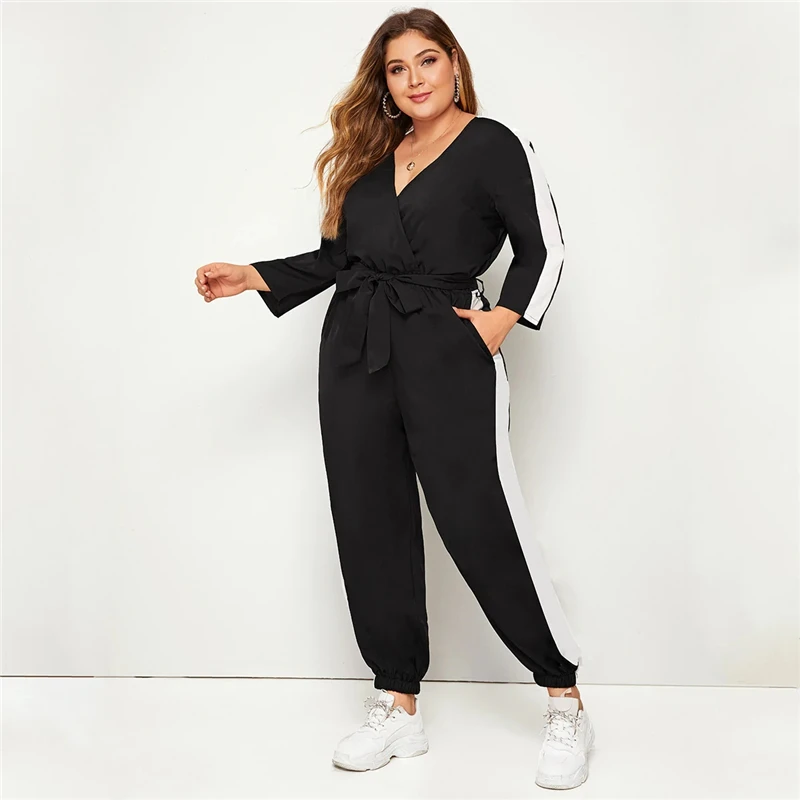 SHEIN плюс размер цветной блок Surplice передний комбинезон с поясом женский весенне-осенний Повседневный v-образный вырез длинный рукав спортивные длинные Комбинезоны