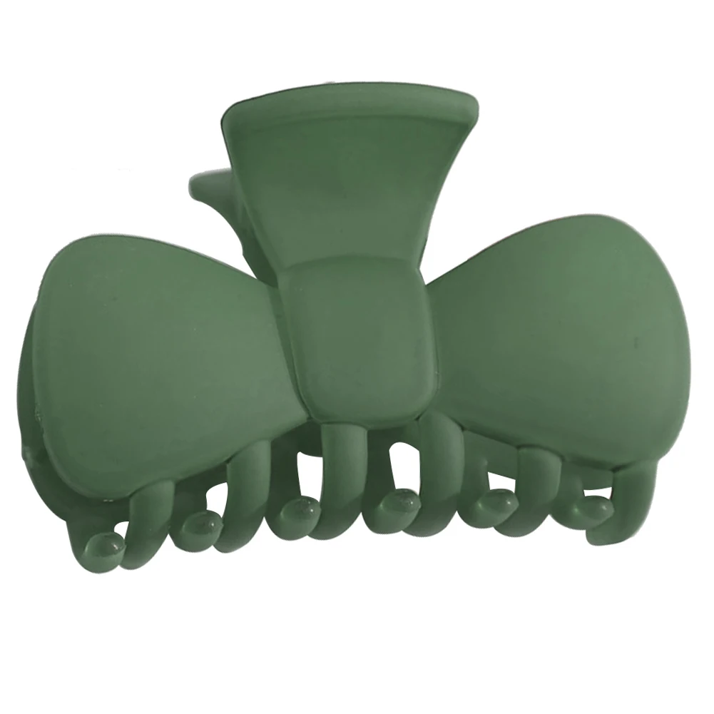 Заколка-зажим для волос в виде банта карамельного цвета |