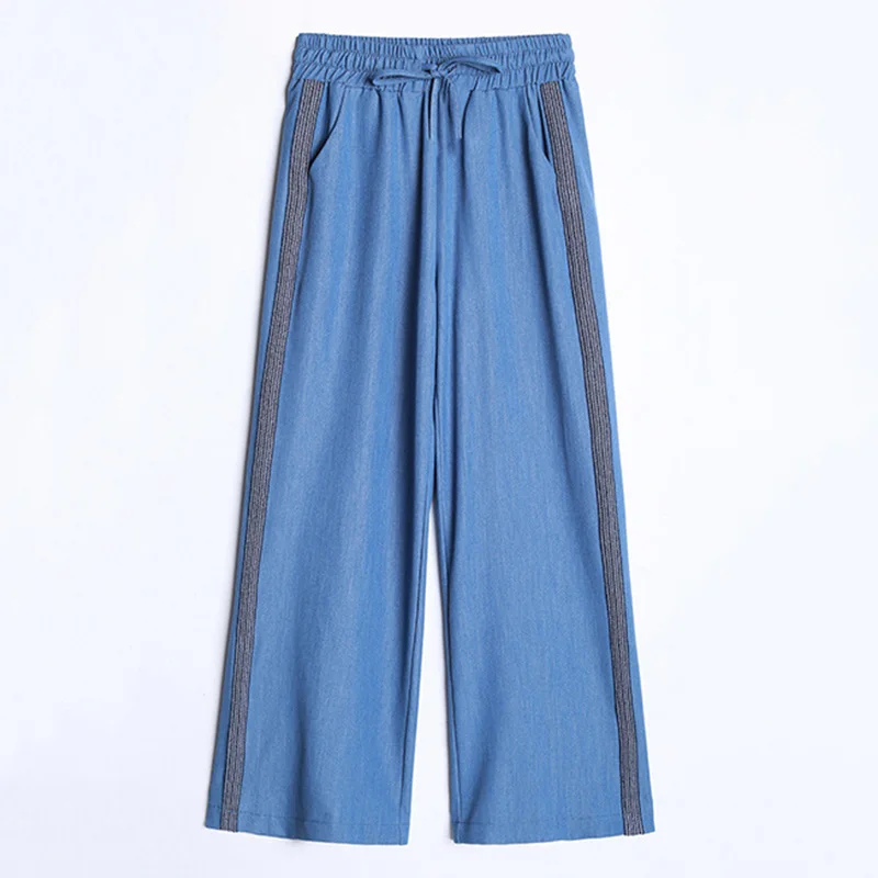 Женские летние джинсы с широкими штанинами тонкие однотонные на шнуровке