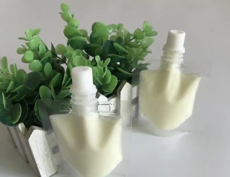 

50ml Clear Plastic Liquid Stand Up Doypack Bag with Cap Drink Storage Pouch Packing Bag with Side Spout Wholesale