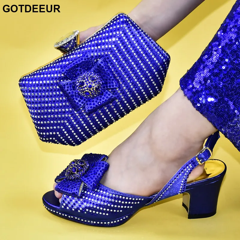 Новейшие туфли в африканском стиле и сумочка комплекте Новое поступление