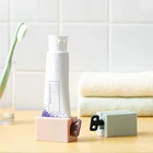 4 цвета Ванная комната устройство для выдавливания зубной пасты дозатор крема трубки сжатия диспенсер Ванная комната аксессуары для очищающее средство для лица