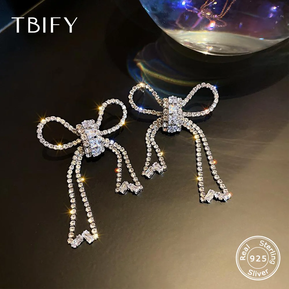 

Блестящие Винтажные висячие серьги TBIFY с большим бантом в виде Стразы для женщин, крупные висячие серьги с блестящими кристаллами, ювелирны...