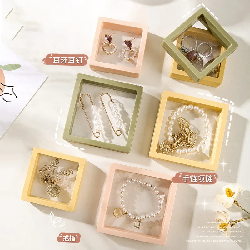 

PE Film Brooch Gems Jewelry Storage Box Dustproof Exhibition Decoration Suspended Floating Ring Earrings Coin Display Rack Case